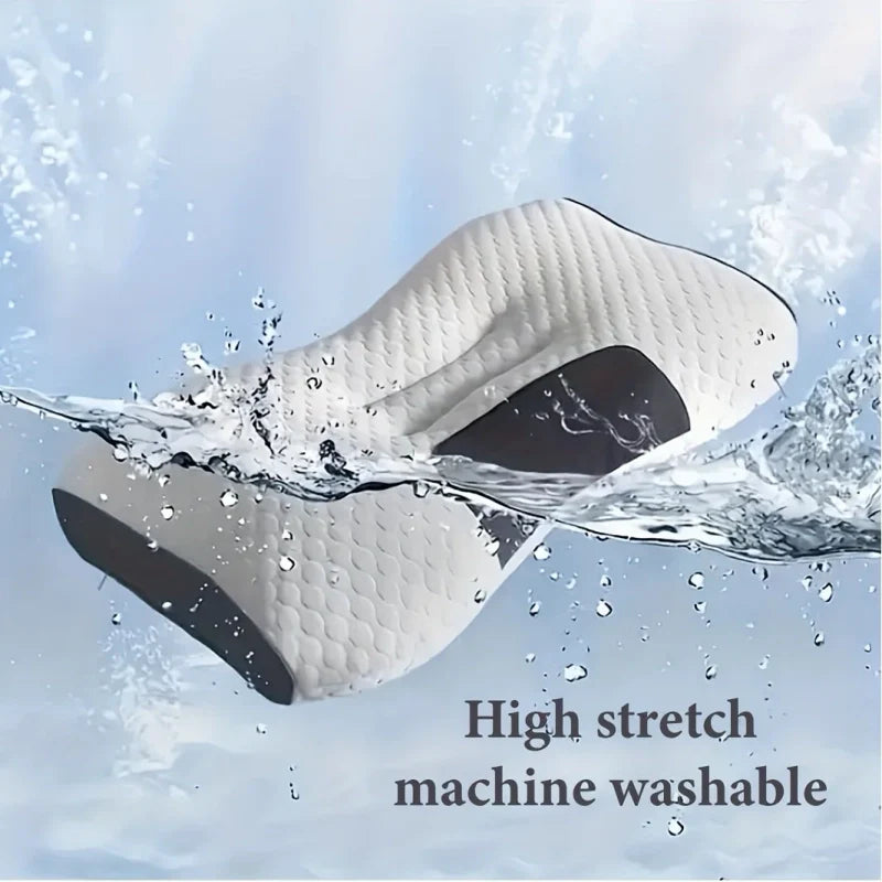 : Ergonomic neck pillow on a neatly made bed for a pain-free sleep setup – HouseComfort